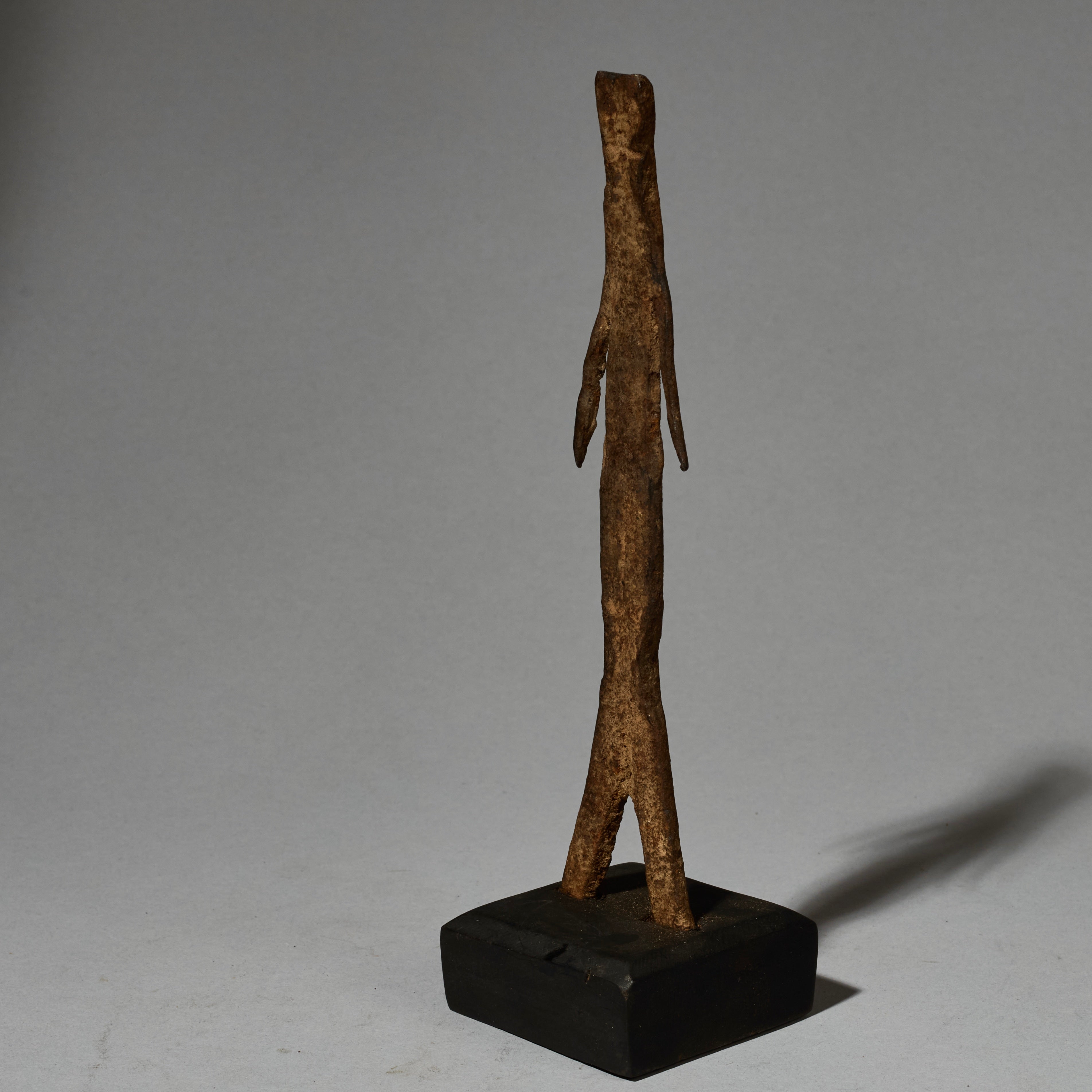 A SMALL IRON FIGURE  FROM LOBI TRIBE BURKINA FASO ( No 5148 )