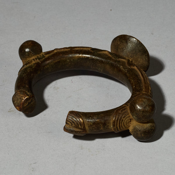 A  BRONZE CURRENY  BRACELET FROM LOBI TRIBE , BURKINA FASO  ( No 5119 )