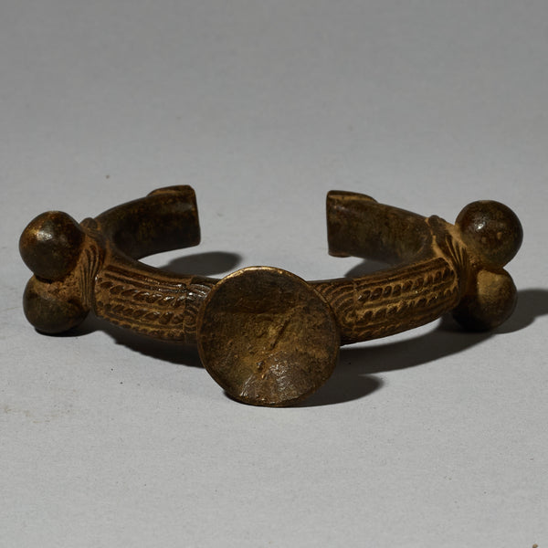 A  BRONZE CURRENY  BRACELET FROM LOBI TRIBE , BURKINA FASO  ( No 5119 )