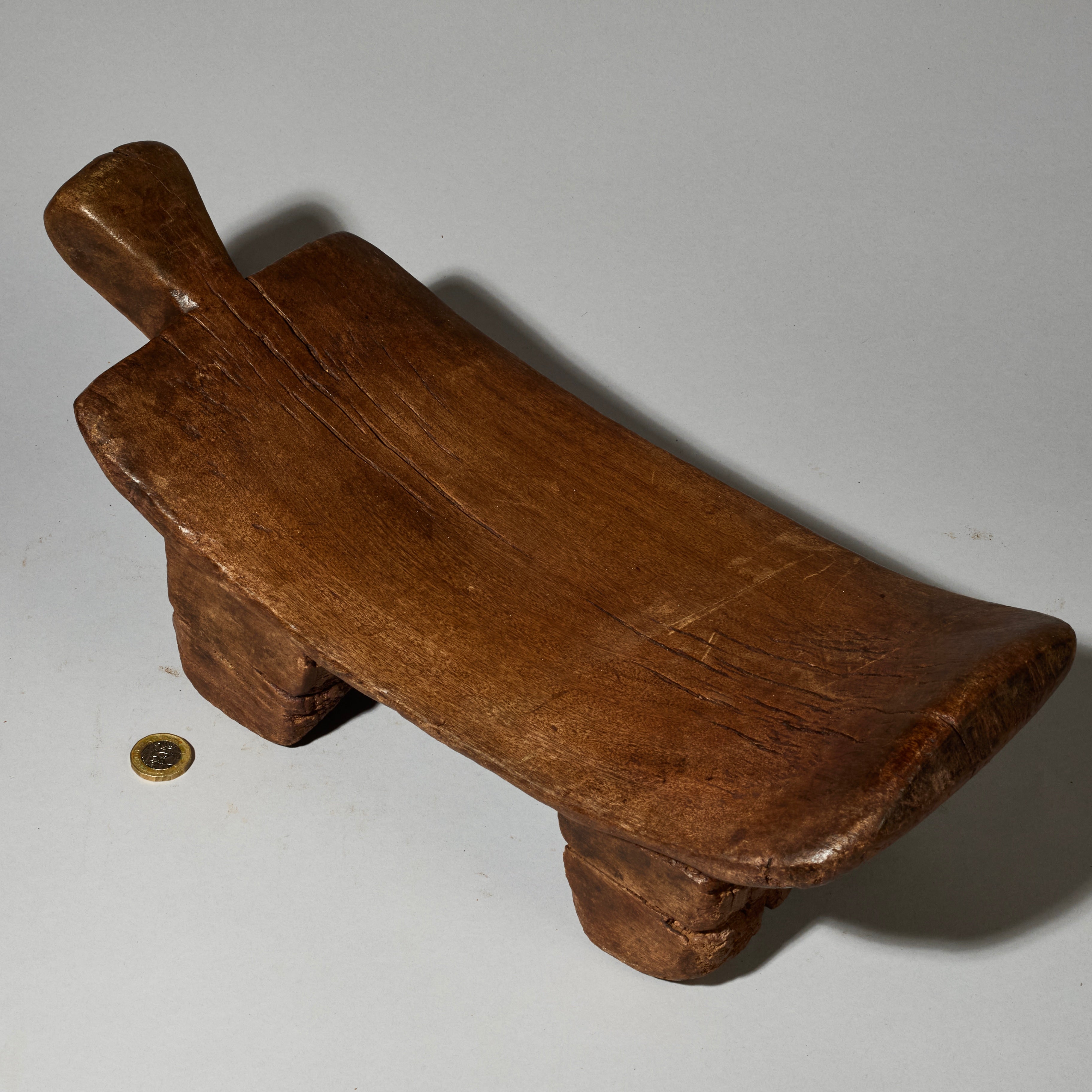 A PATINATED ABSTRACTED ANIMAL STOOL FROM BURKINA FASO ( No 5161 )