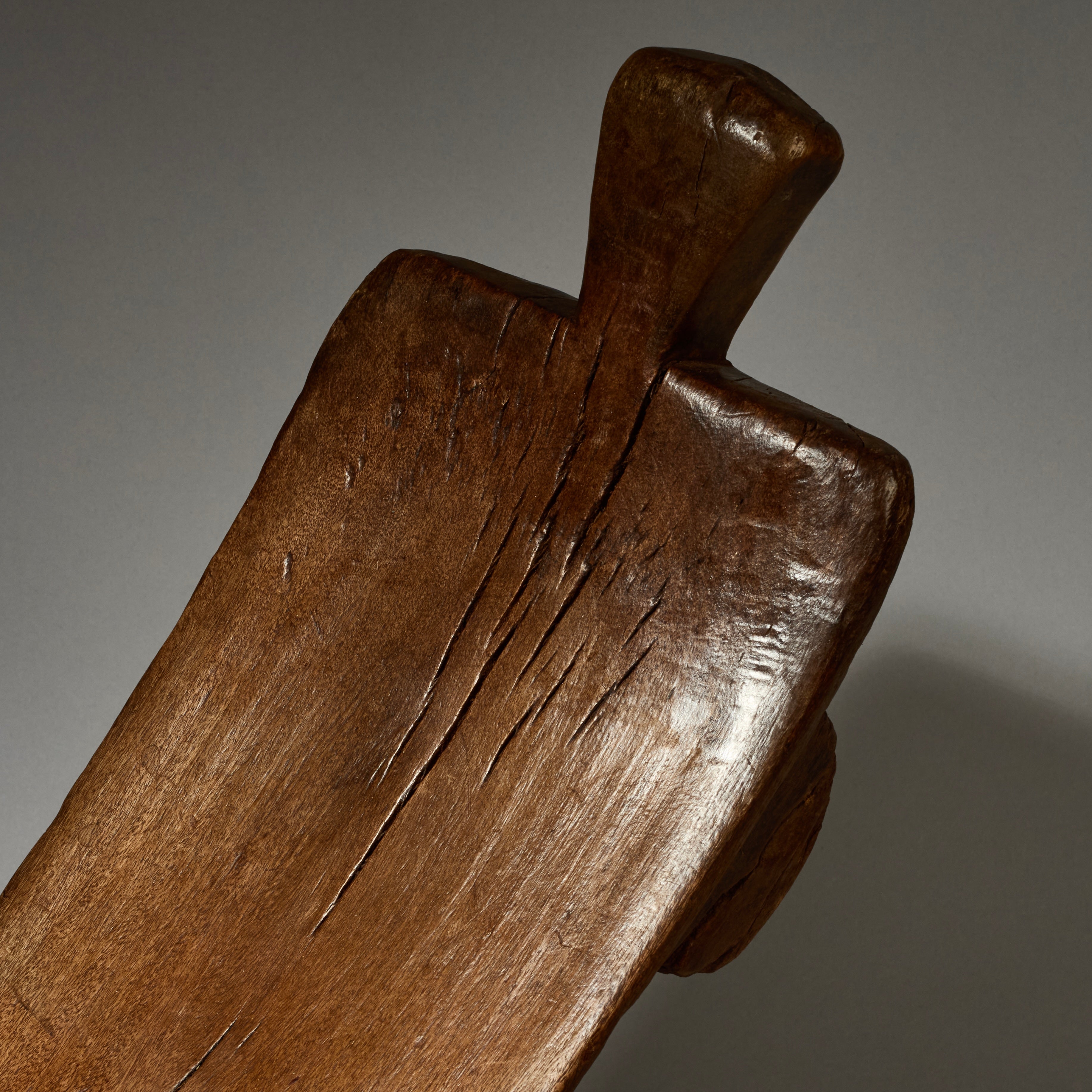 A PATINATED ABSTRACTED ANIMAL STOOL FROM BURKINA FASO ( No 5161 )