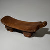 A PATINATED ABSTRACTED ANIMAL STOOL FROM BURKINA FASO ( No 5161 )