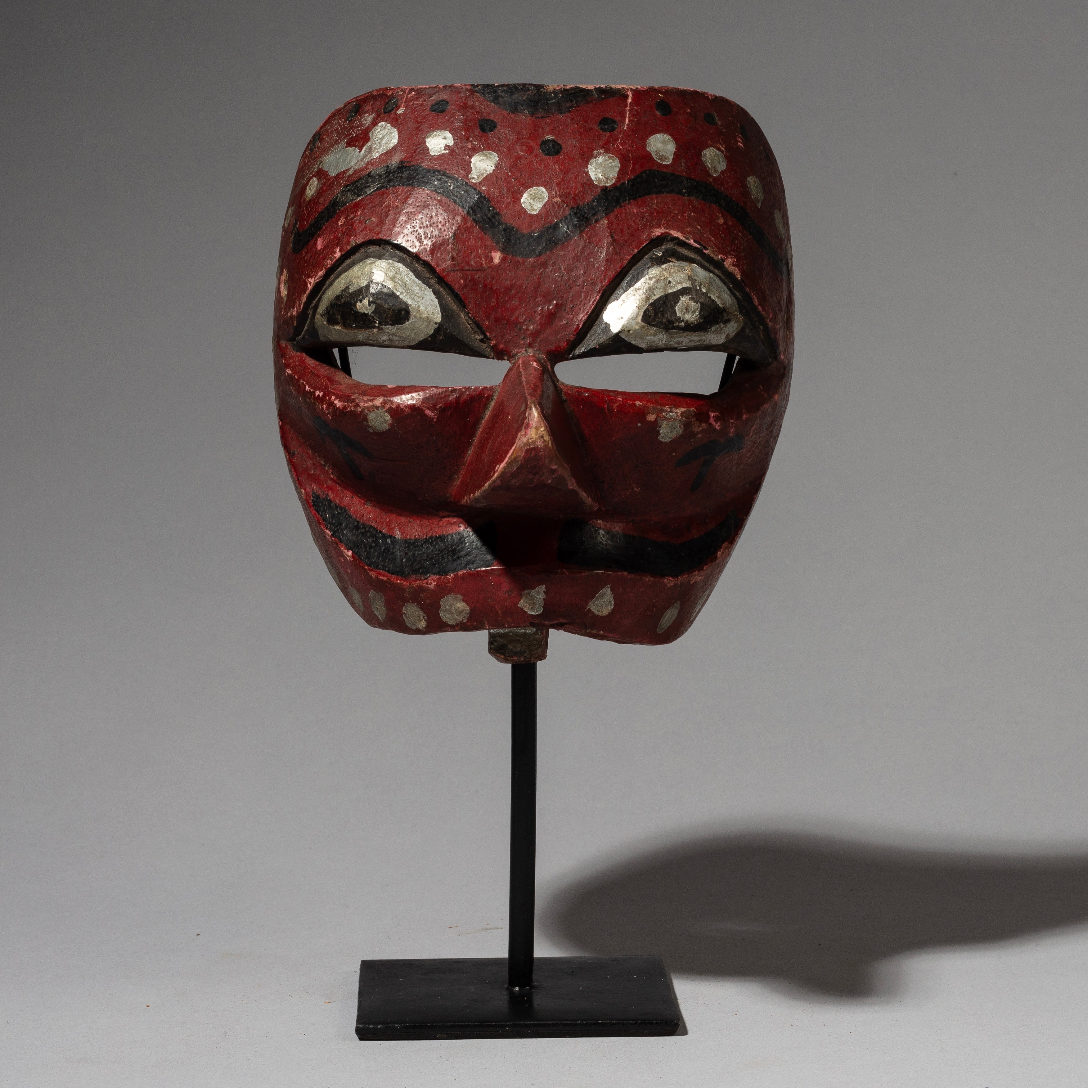 A TRADITIONAL RED JAVANESE TOPENG MASK FROM INDONESIA( No 1922)