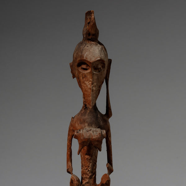 AN ERODED FIGURAL STAFF FROM DAYAK PEOPLE OF INDONESIA ( No 1915 )