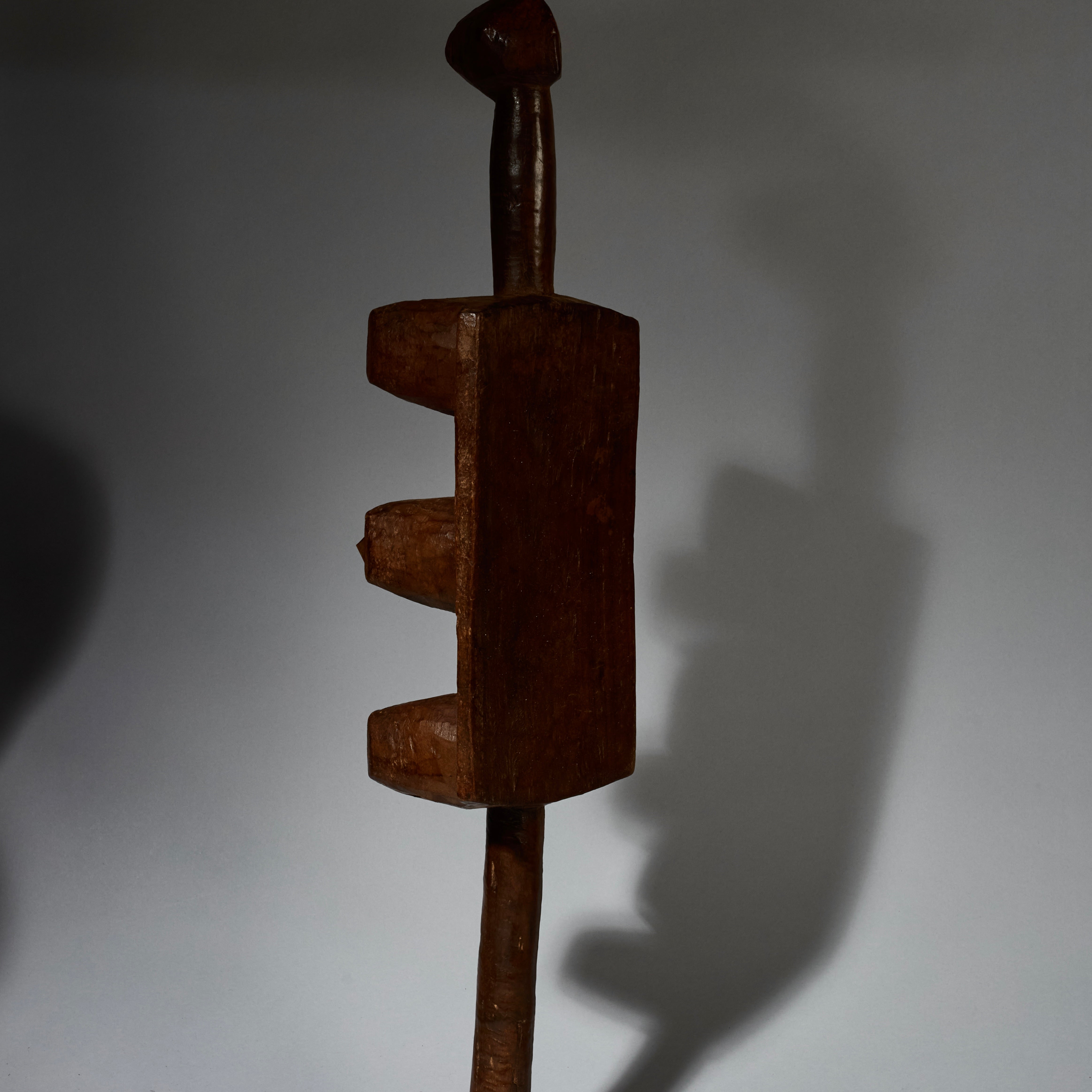 AN ABSTRACTED LONG ANIMAL STOOL FROM BURKINA FASO ( No 5162 )