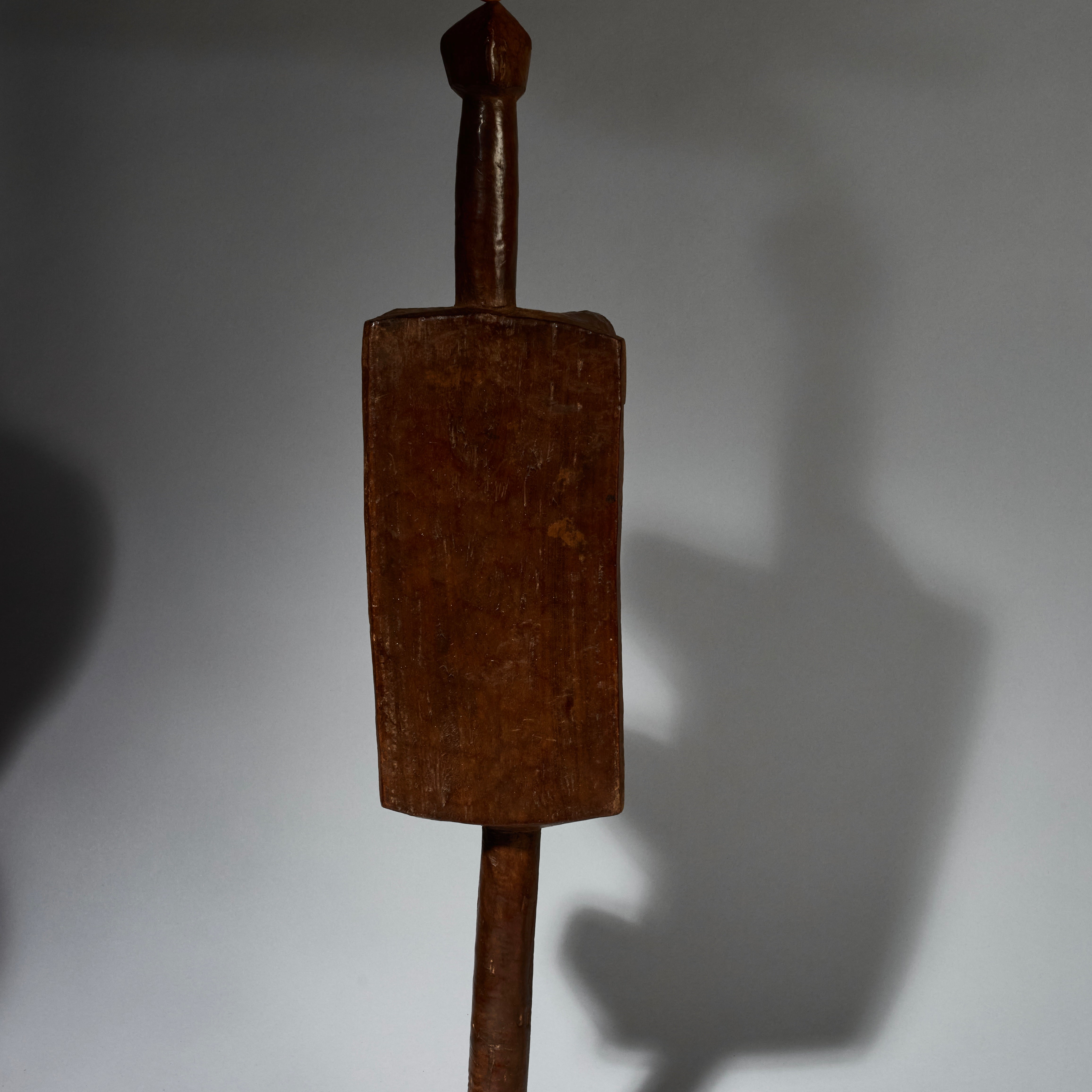 AN ABSTRACTED LONG ANIMAL STOOL FROM BURKINA FASO ( No 5162 )