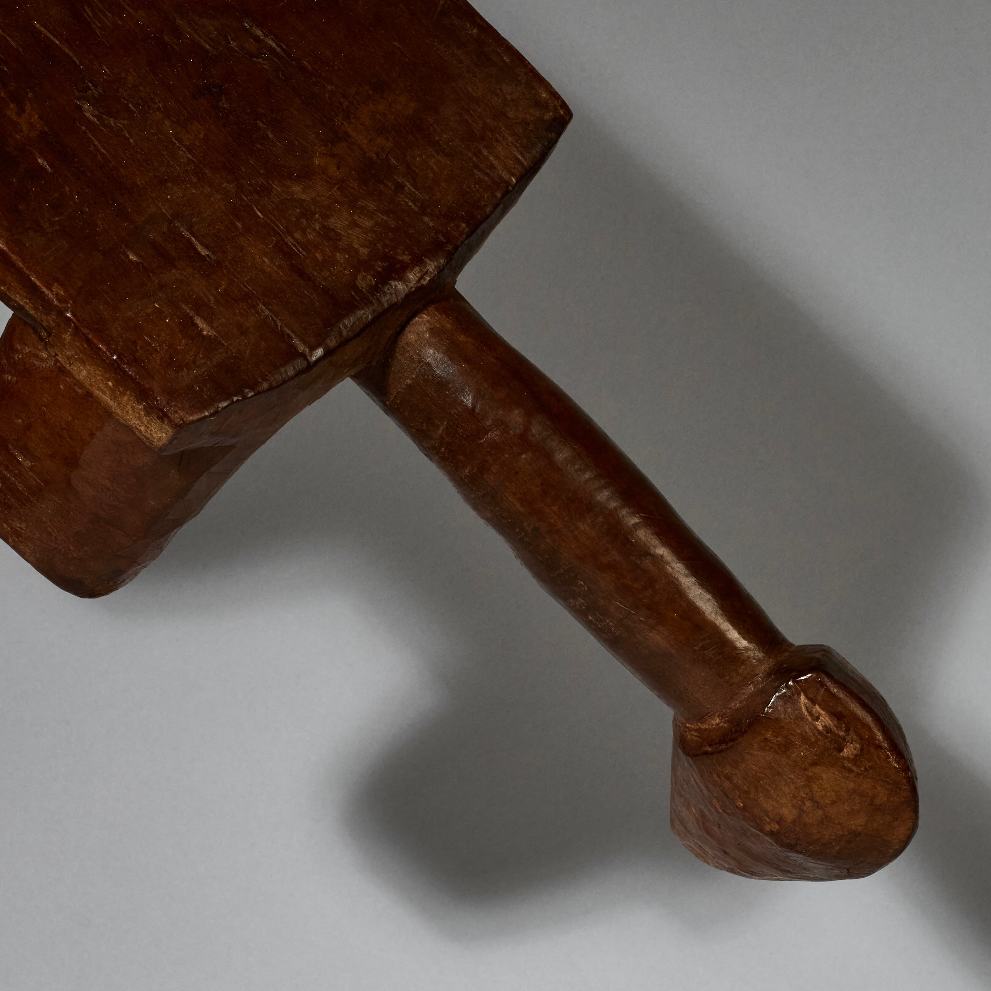 AN ABSTRACTED LONG ANIMAL STOOL FROM BURKINA FASO ( No 5162 )