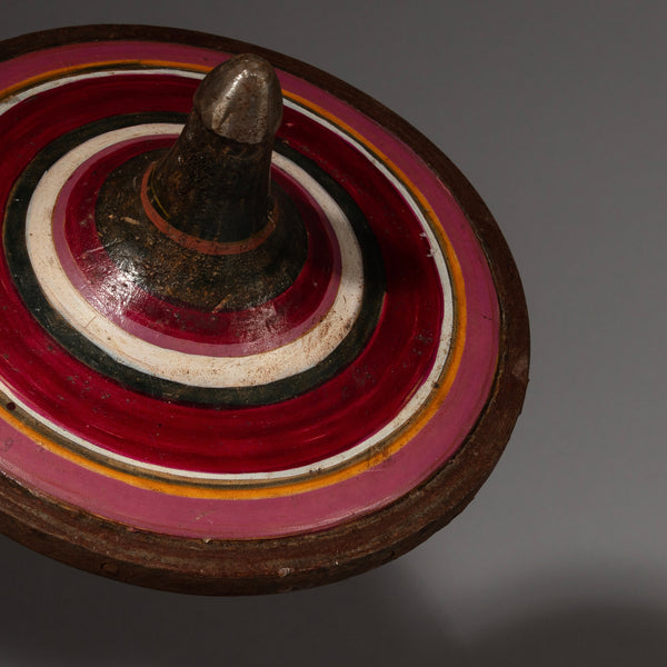A BEAUTEOUS BURGUNDY SPINNING TOP FROM INDONESIA( No 1919)