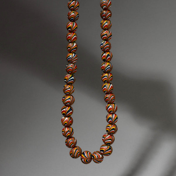 AN OUTSTANDING STRING OF LARGE STRIPED BEADS, JAVA INDONESIA ( No 1926)