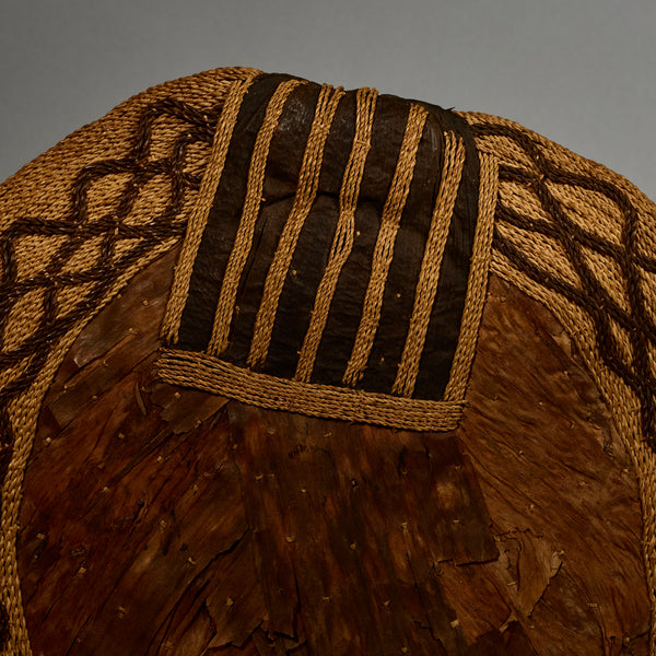 A SUPERB  ANTIQUE BARK BUTTOCK ADORNMENT, EX UK COLL. MANGBETU  TRIBE OF THE CONGO( No 5168 )