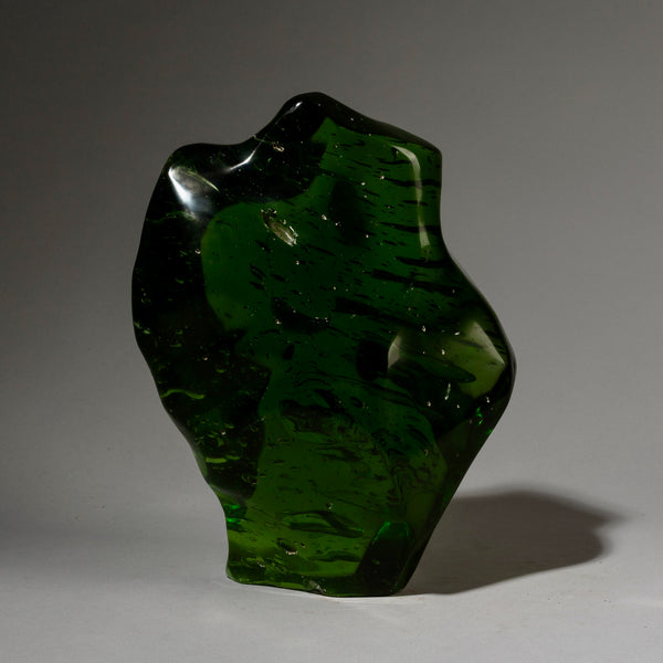 A DEEP BOTTLE GREEN GLASS FORM FROM MADAGASCAR ( No 1897)
