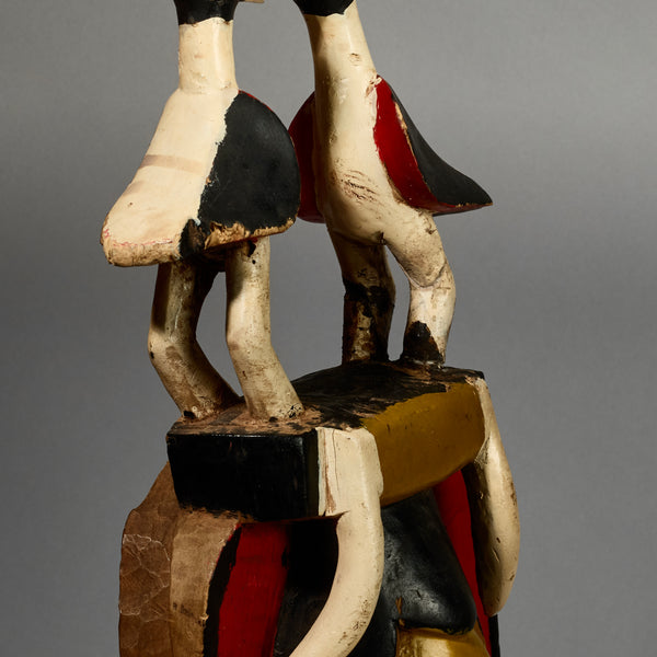 A RADIANT YELLOW GURO MASK WITH BIRDS,  FROM THE IVORY COAST W AFRICA ( No 5154 )