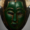 A GORGEOUS GREEN GURO MASK WITH BIRD,  FROM THE IVORY COAST W AFRICA ( No 5152)
