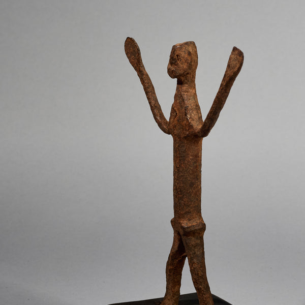 A PETITE ARMS FLAILIMG IRON FIGURE  FROM LOBI TRIBE BURKINA FASO ( No 5195 )