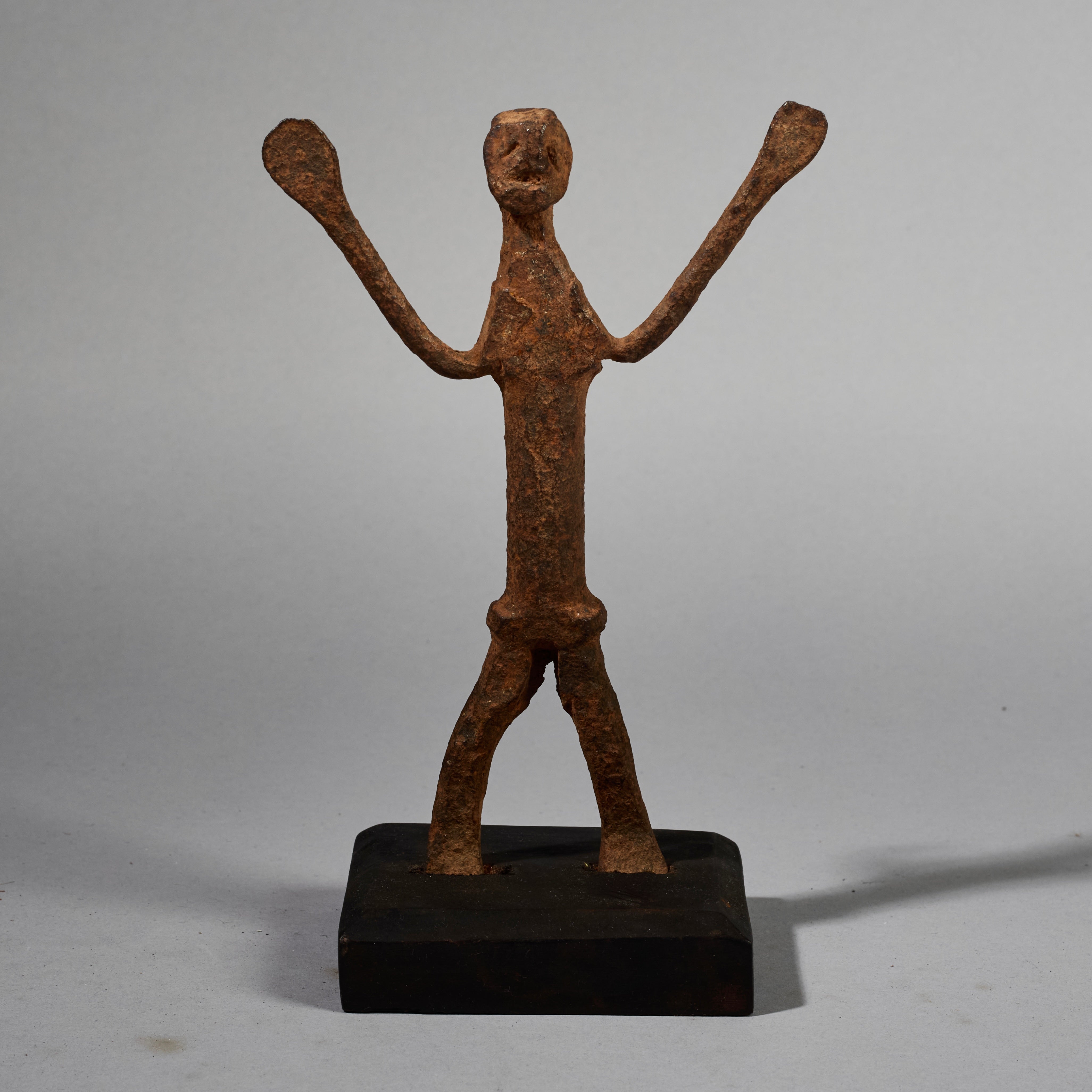 A PETITE ARMS FLAILIMG IRON FIGURE  FROM LOBI TRIBE BURKINA FASO ( No 5195 )