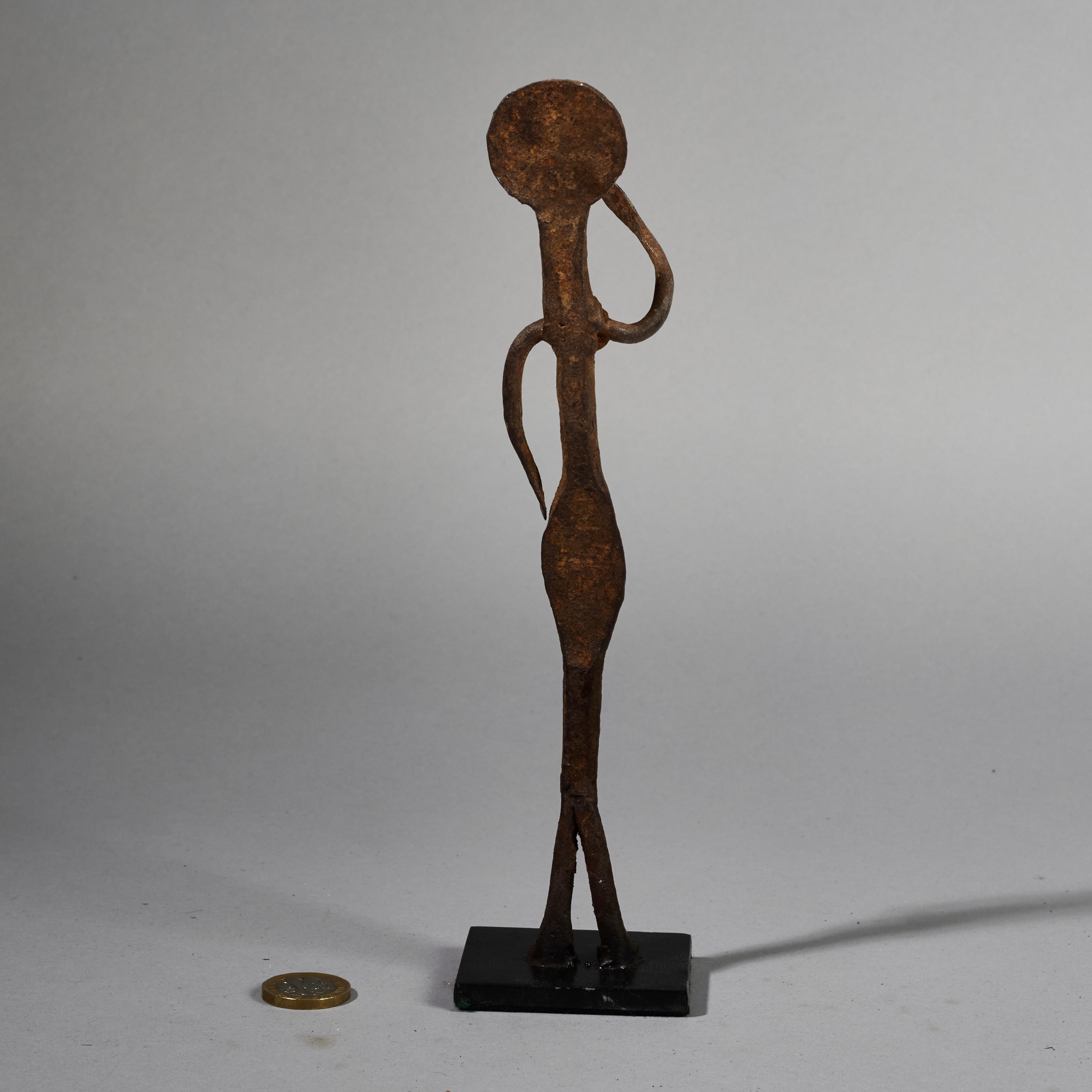 A QUIRKY IRON FIGURE  FROM LOBI TRIBE BURKINA FASO ( No 5194