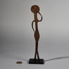 A QUIRKY IRON FIGURE  FROM LOBI TRIBE BURKINA FASO ( No 5194