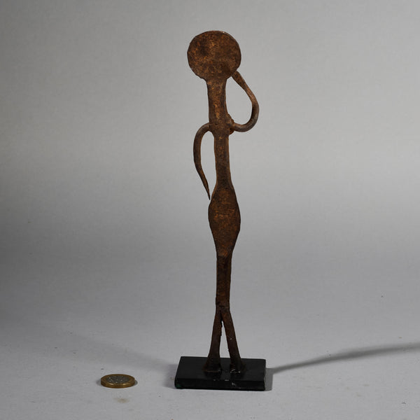 A QUIRKY IRON FIGURE  FROM LOBI TRIBE BURKINA FASO ( No 5194
