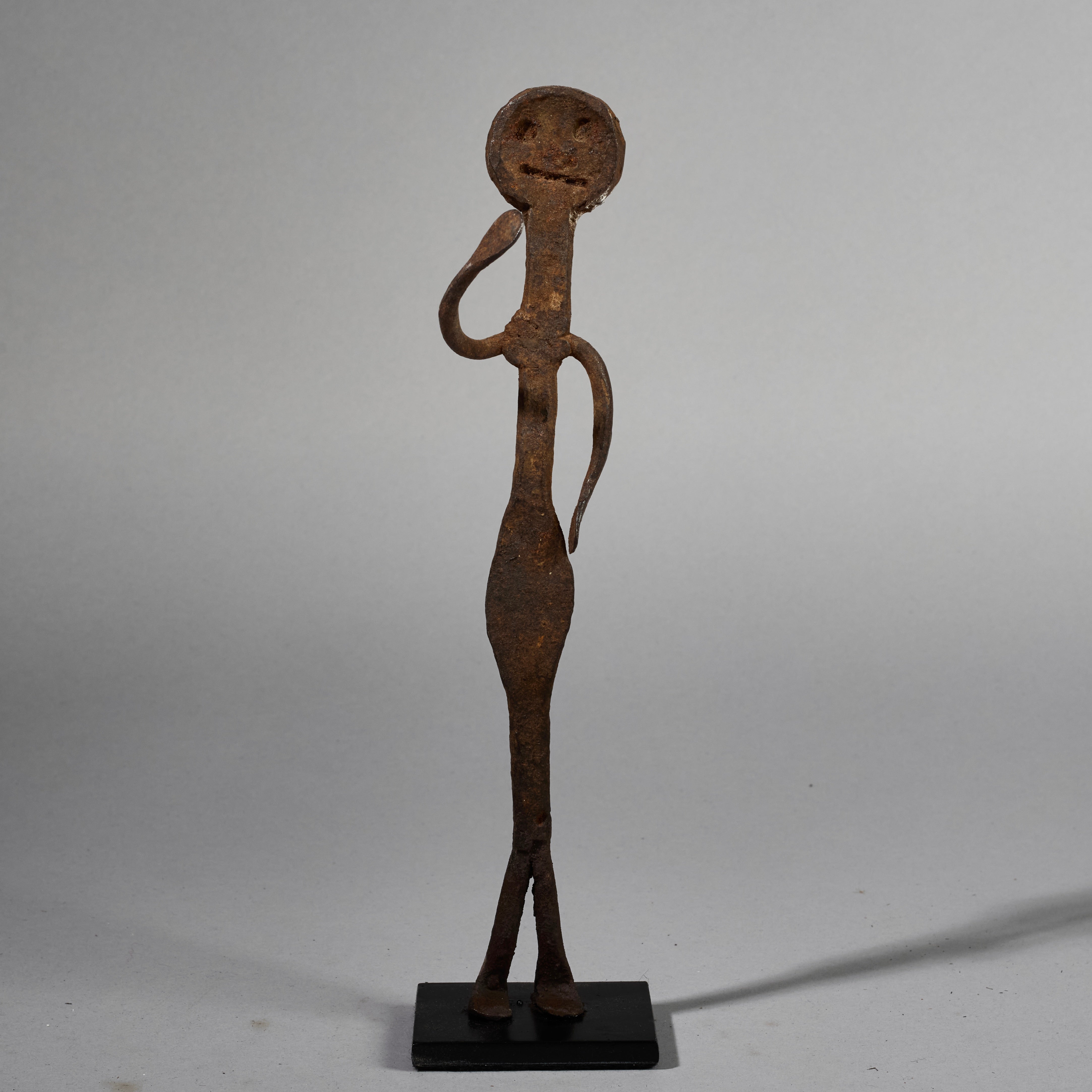 A QUIRKY IRON FIGURE  FROM LOBI TRIBE BURKINA FASO ( No 5194