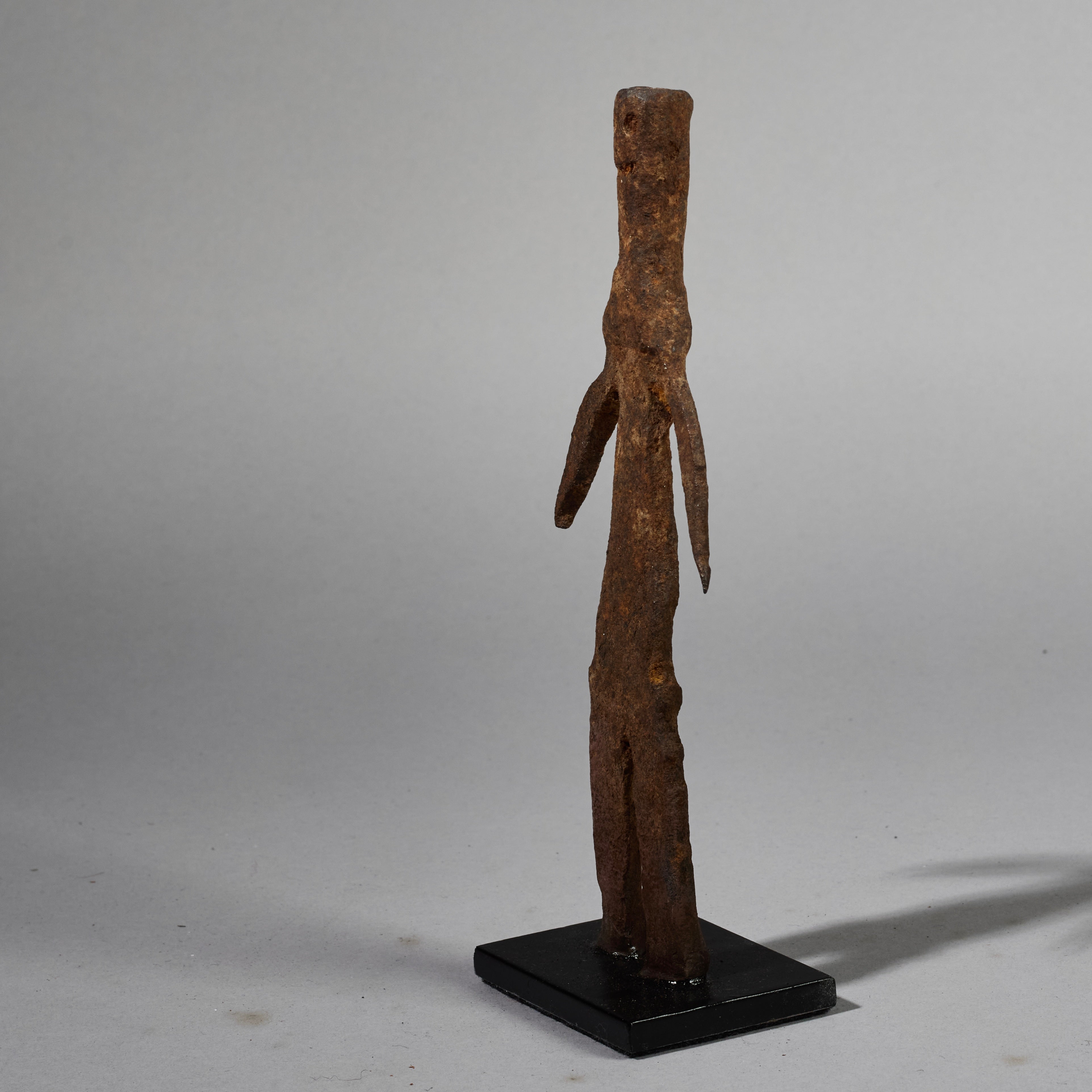 AN OXIDISED IRON DIVINATION SCULPTURE  FROM THE LOBI TRIBE OF BURKINA FASO ( No 6227)
