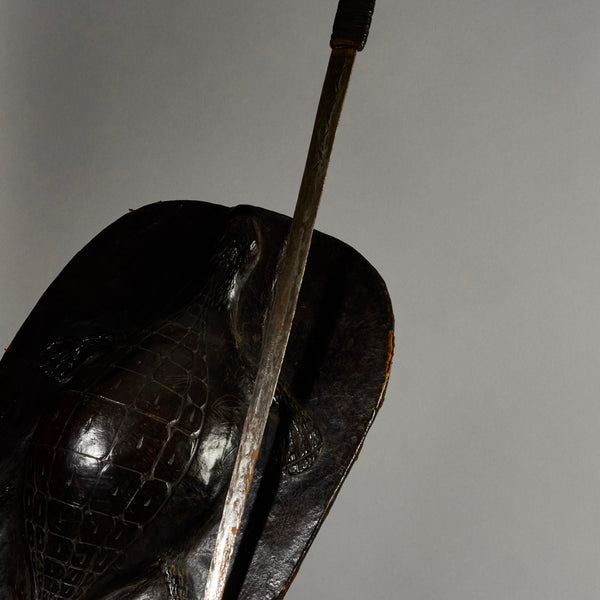 A RARE SHAPED LEATHER SHIELD, WITH INBUILT SWORD, FROM SHILUK PEOPLE  E.AFRICA ( No 6295