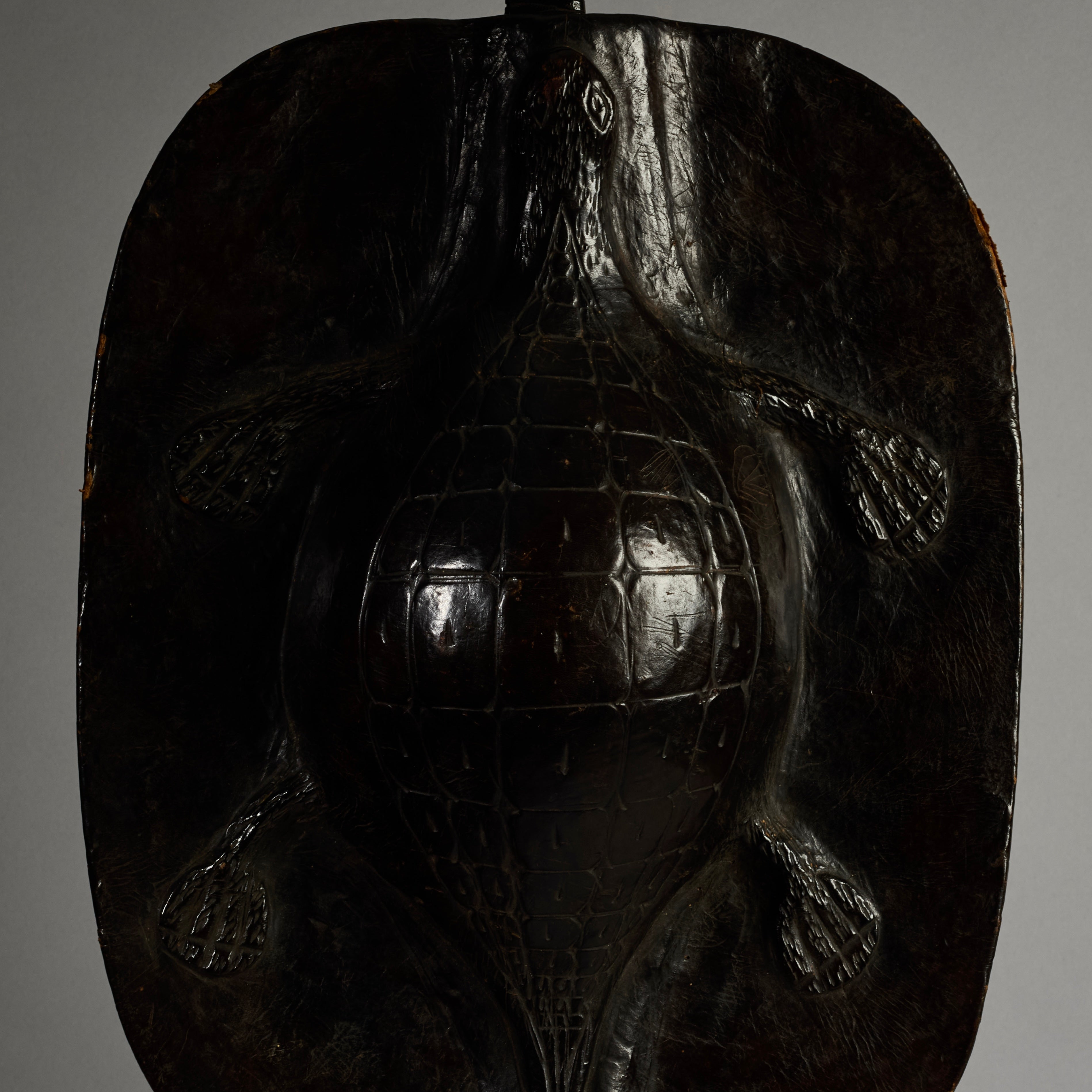 A RARE SHAPED LEATHER SHIELD, WITH INBUILT SWORD, FROM SHILUK PEOPLE  E.AFRICA ( No 6295