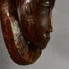 A PRETTY BAULE MASK , EX UK COLLECTION WITH TRADITIONAL BUNCH HAIRSTYLE FROM THE IVORY COAST W.AFRICA ( No 6296 )