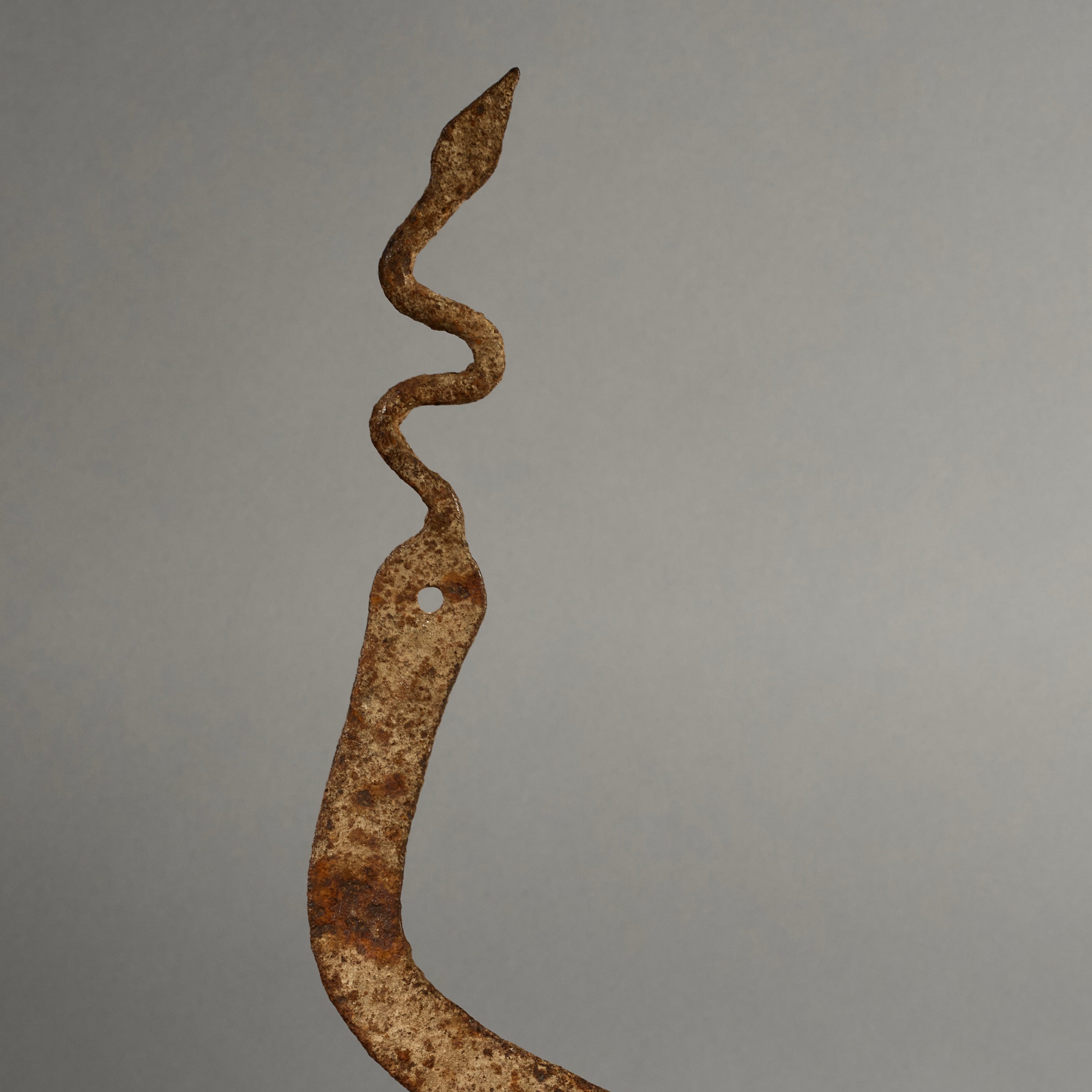 AN OXIDISED IRON SNAKE TALISMAN FROM THE LOBI TRIBE OF BURKINA FASO ( No 6228)