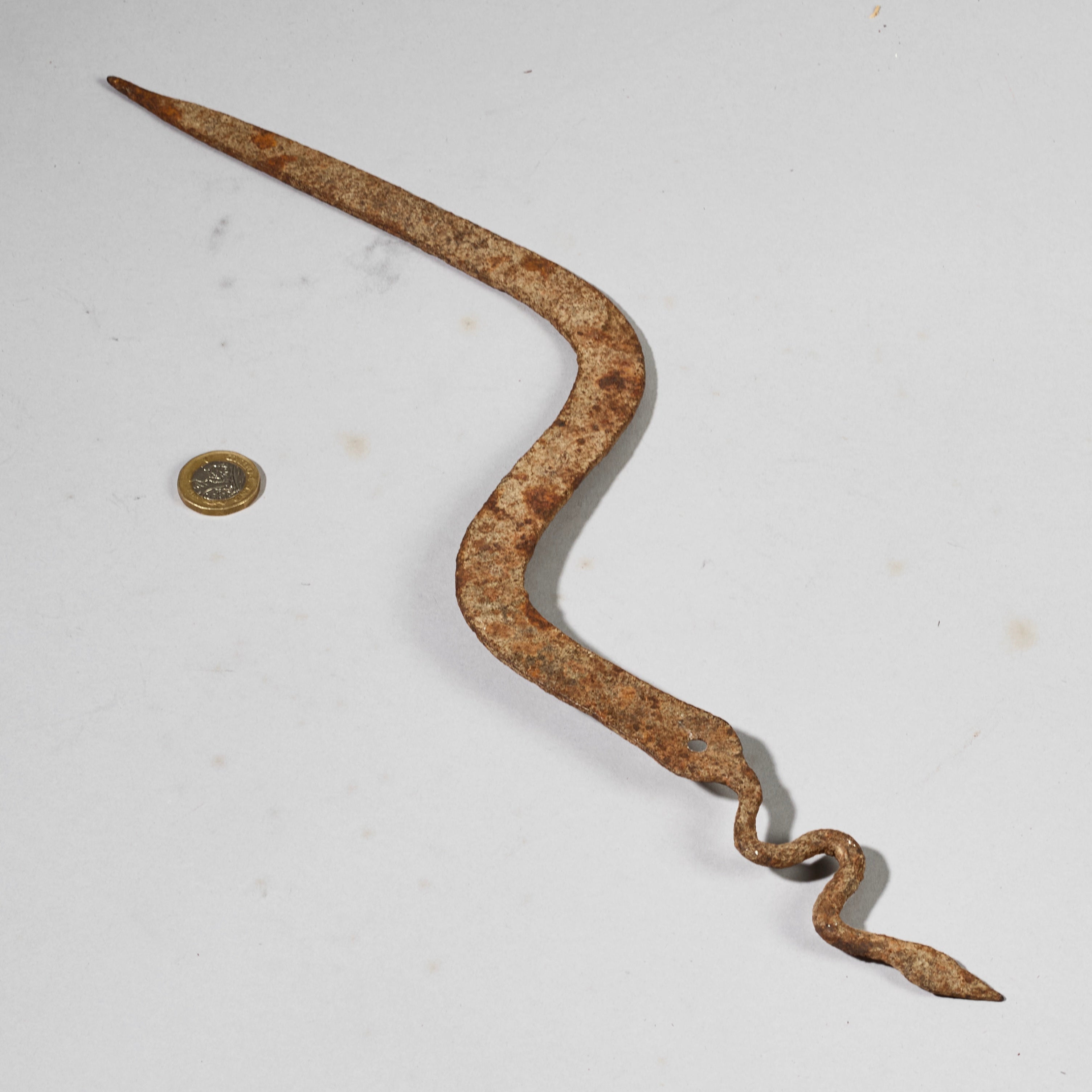 AN OXIDISED IRON SNAKE TALISMAN FROM THE LOBI TRIBE OF BURKINA FASO ( No 6228)