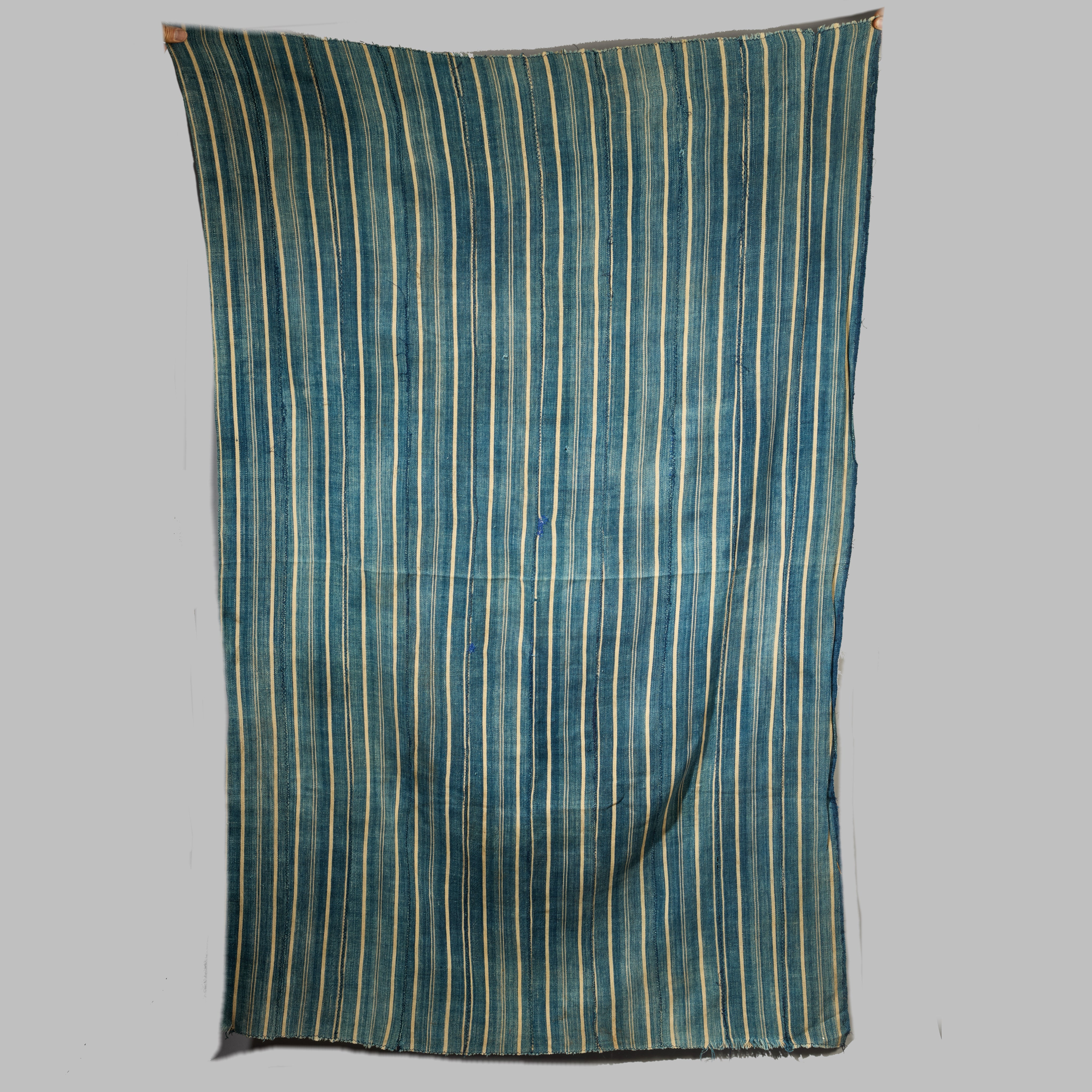 A WELL USED INDIGO STRIPED WOMANS CLOTH, NORTHERN GHANA ( No 5010 )