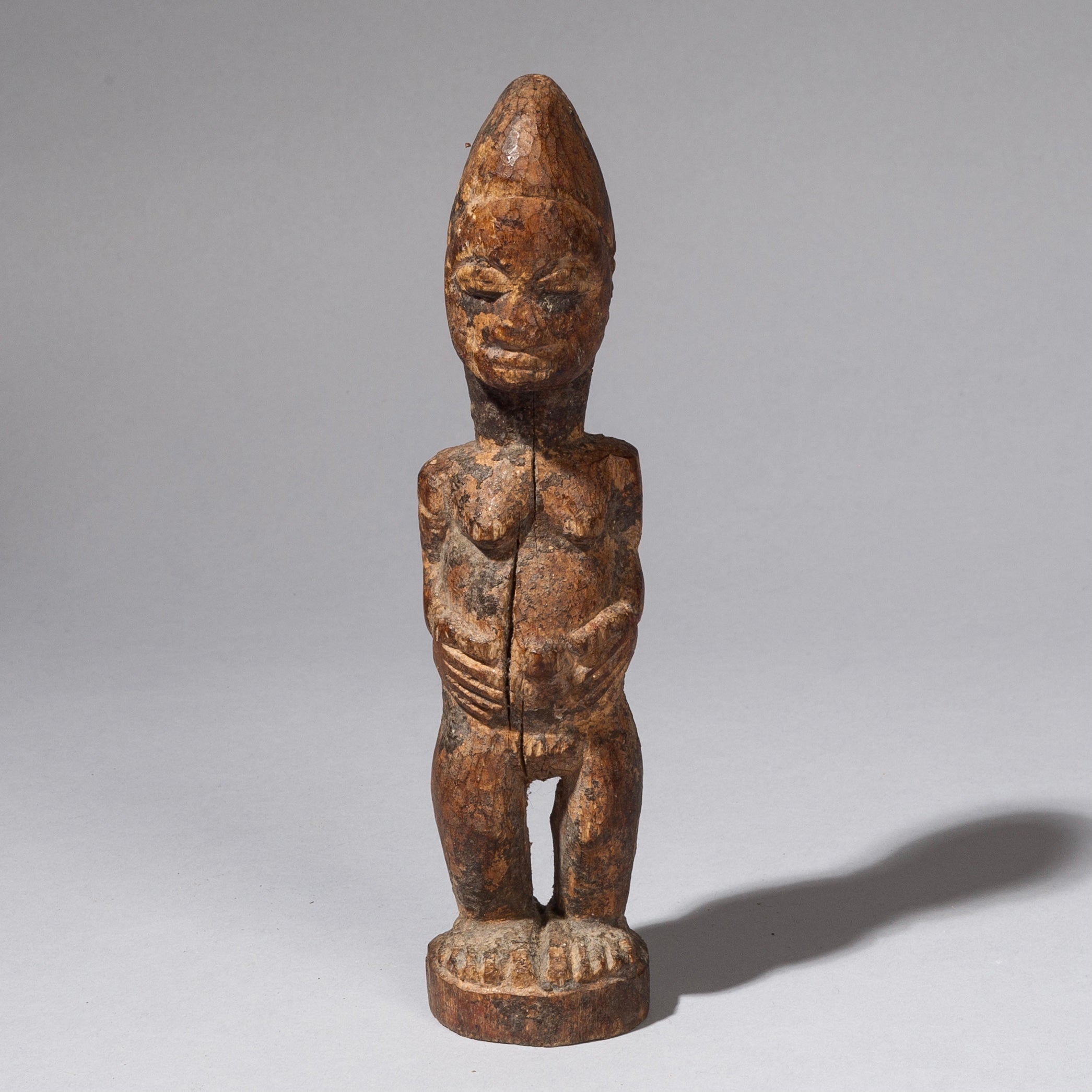 AN ENCRUSTED BAULE ALTAR FIGURE, IVORY COAST, W AFRICA   ( No 385)