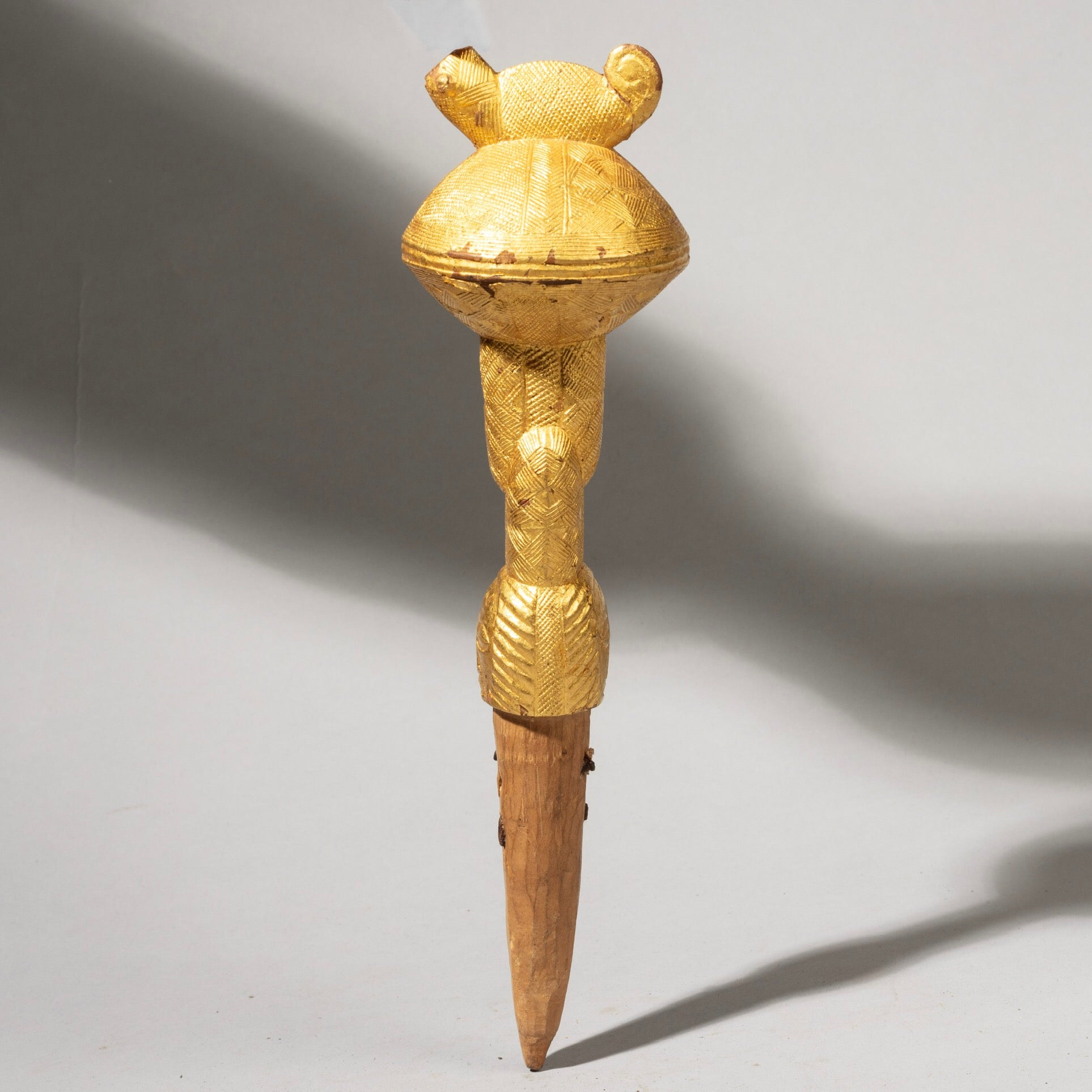 A GOLD LEAF COVERED FLY WHISK HANDLE, BAULE TRIBE IVORY COAST( No 1165 )