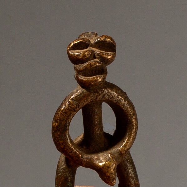 A SENUFO DIVINATION BRONZE FROM THE IVORY COAST ( No 3029 )