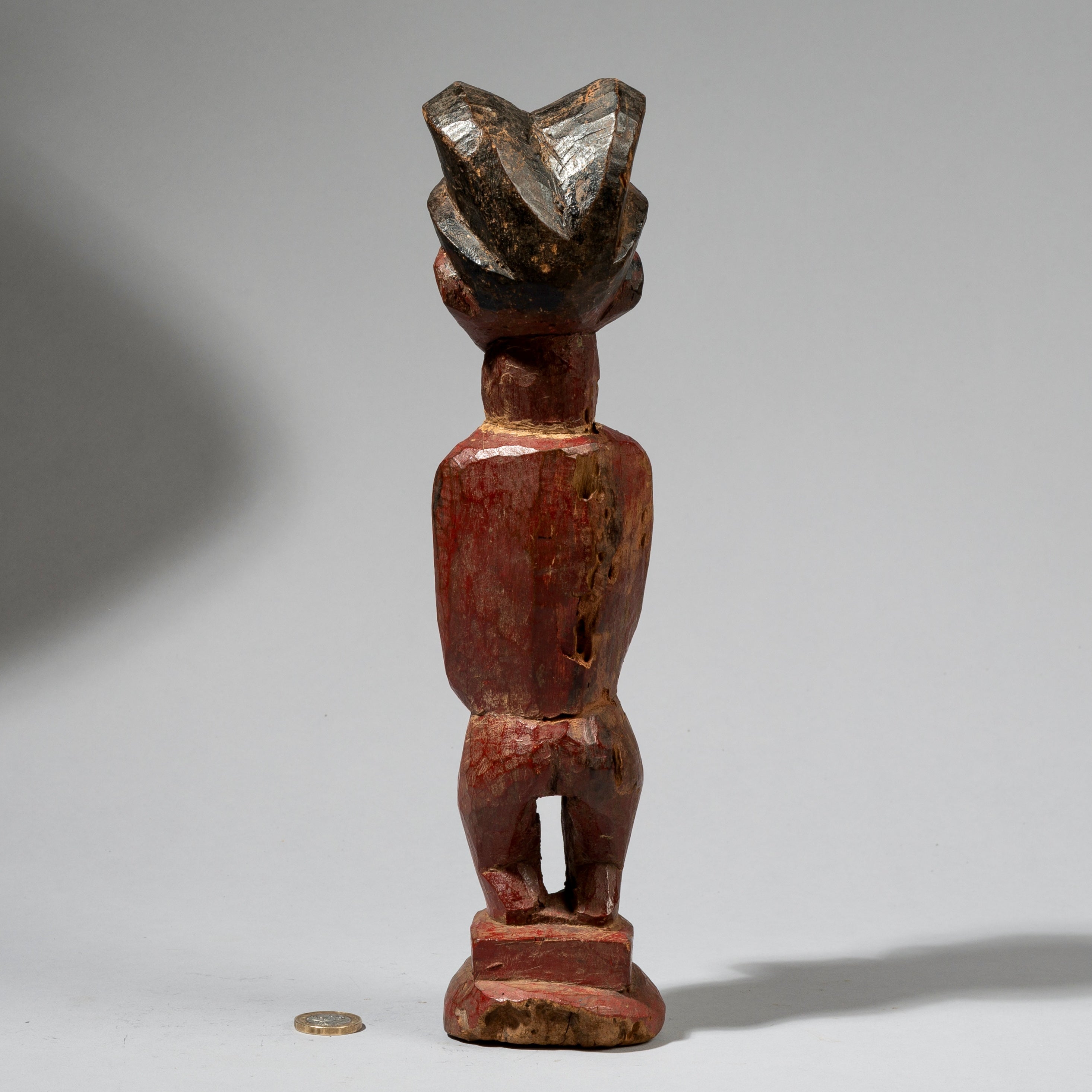 A RADICALLY RED ATTYE COLON FIGURE FROM THE IVORY COAST  ( No 729 )