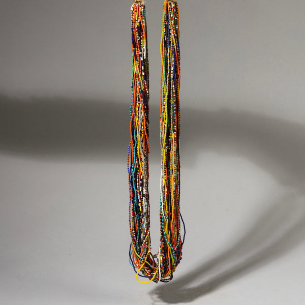 A MIXED COLOUR MULTI STRAND NECKLACE, BAULE TRIBE IVORY COAST W.AFRICA ( No 1046)