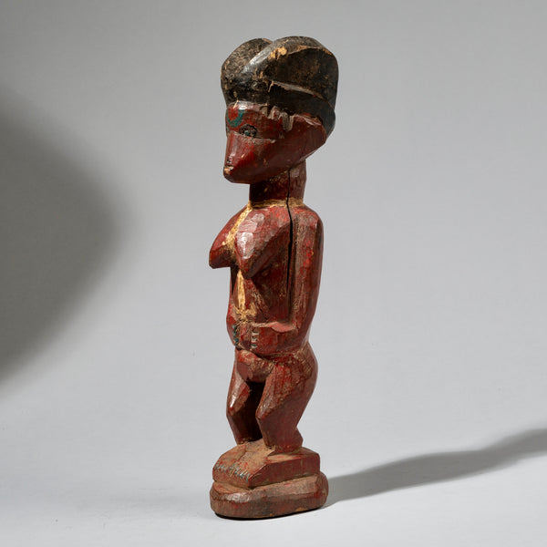 A RADICALLY RED ATTYE COLON FIGURE FROM THE IVORY COAST  ( No 729 )