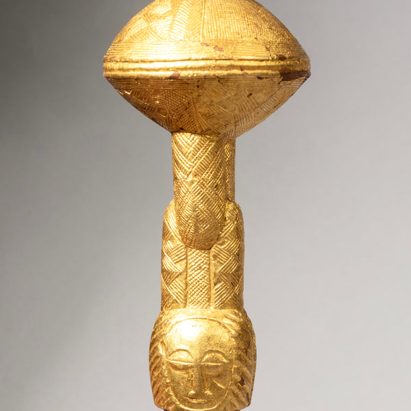 A GOLD LEAF COVERED FLY WHISK HANDLE, BAULE TRIBE IVORY COAST( No 1165 )