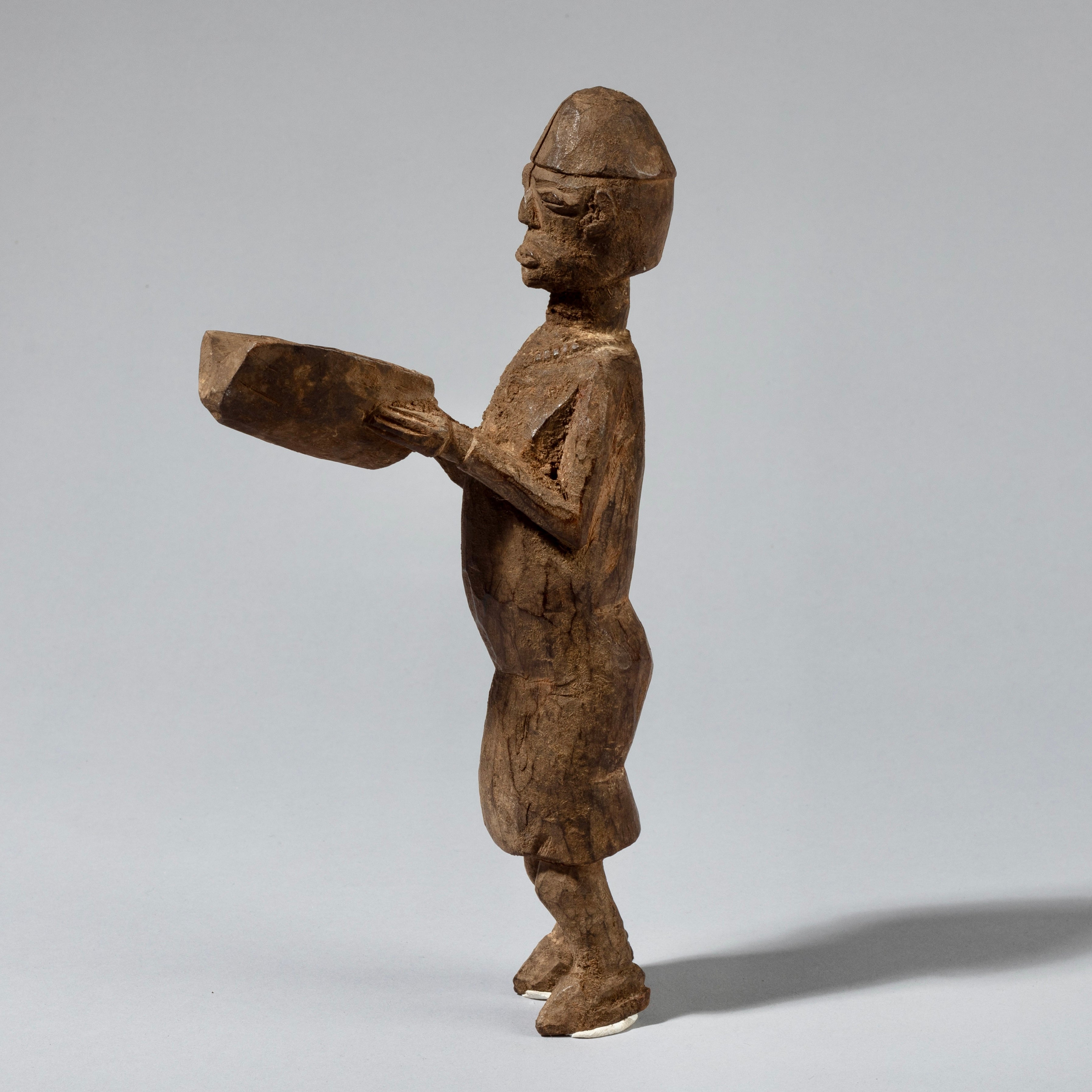 AN UNEXPECTED LOBI THIL FIGURE, WITH A BOOK, BURKINA FASO ( No 753 )