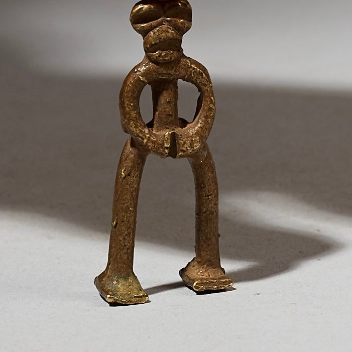 A SENUFO DIVINATION BRONZE FROM THE  IVORY COAST ( No 3028 )