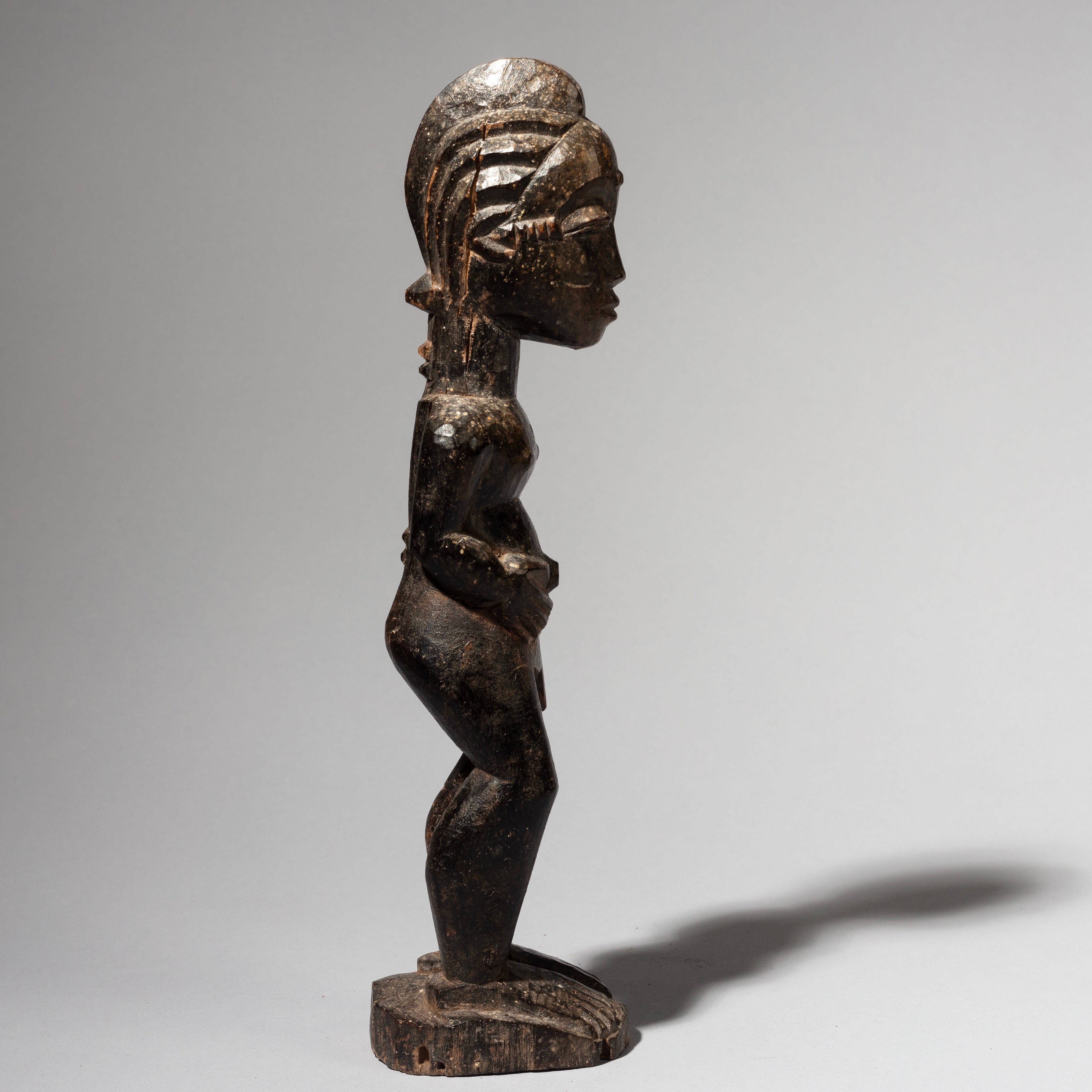 A SERENE BAULE TRIBE STATUE FROM IVORY COAST ( No 1292)