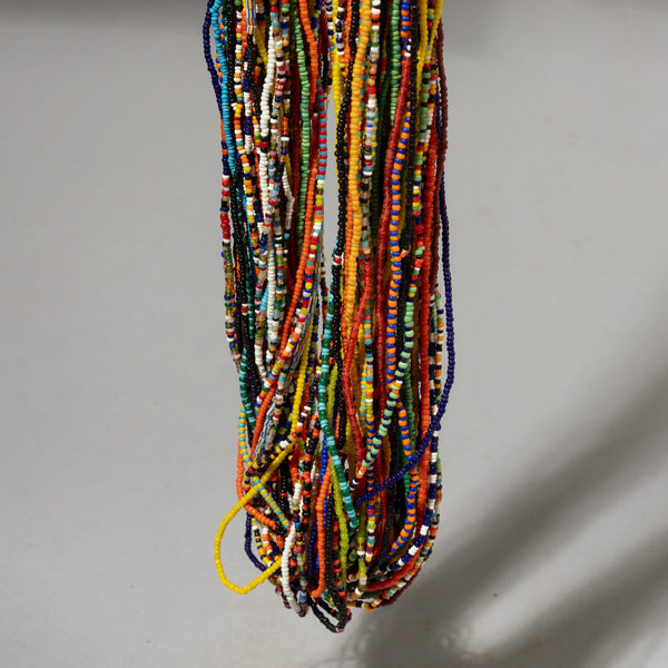 A MIXED COLOUR MULTI STRAND NECKLACE, BAULE TRIBE IVORY COAST W.AFRICA ( No 1046)